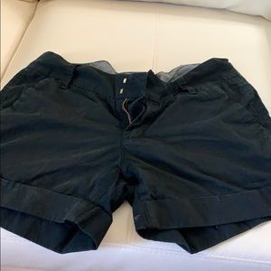 black shorts, rolled